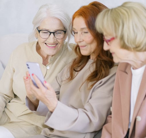 Group of old women that has a video chatting